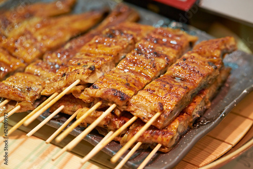 Grilled eel skewers at traditional market 