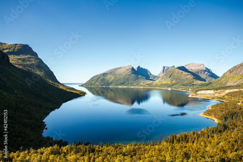 Serene mountain lake surrounded by majestic mountains