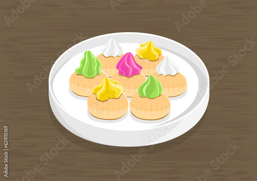 Malaysia and Singapore childhood traditional snacks. Colorful Iced Gem a snack sweet biscuits on white plate on dark wood table (ID: 624115169)