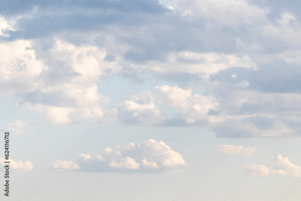 soft blue clouds in the flood rays of the sun soft blue clouds in the flood rays of the sun