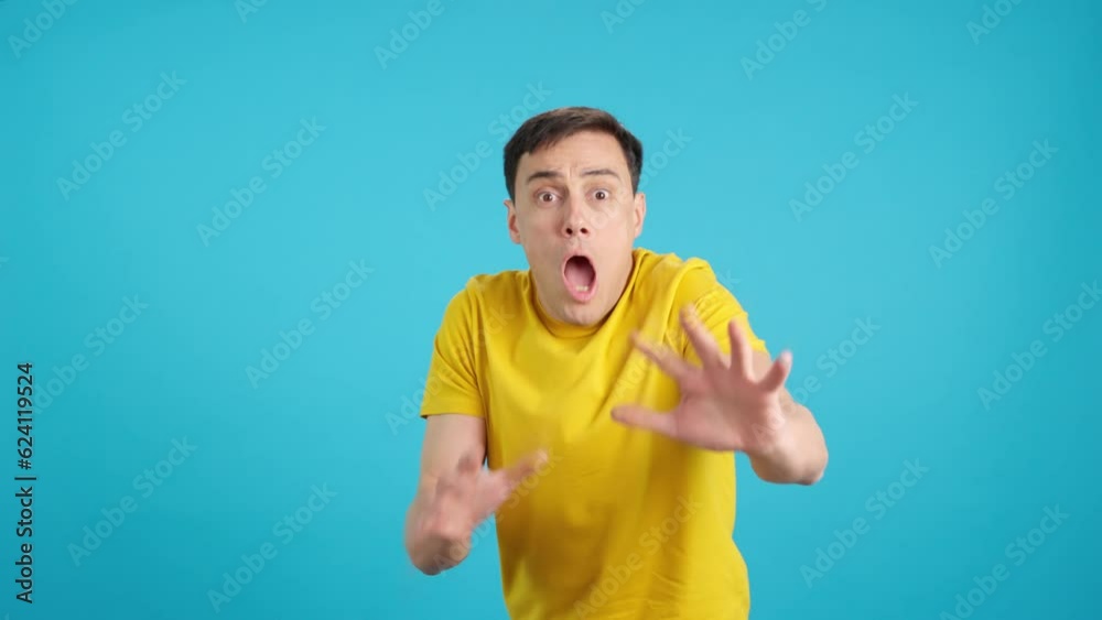 Scared man gesturing with the hands in fear Scared man gesturing with the hands in fear