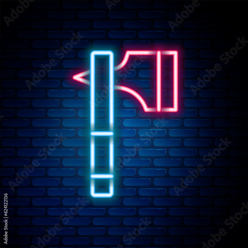 Glowing neon line Wooden axe icon isolated on brick wall background. Lumberjack axe. Colorful outline concept. Vector