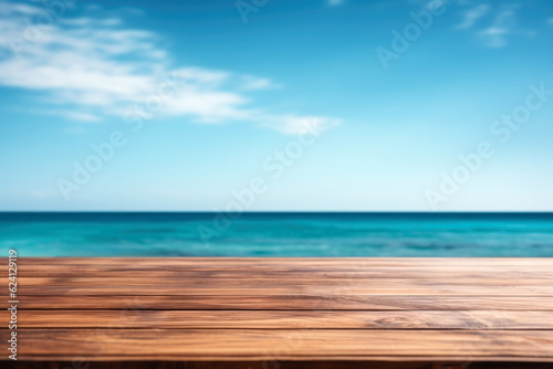 Wooden table top on blur ocean and blue sky background - can be used for display or montage your products. High quality photo