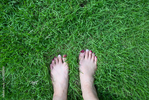 Photography Barefoot on grass, earthing grounding energy, Alternative holistic healing with nature