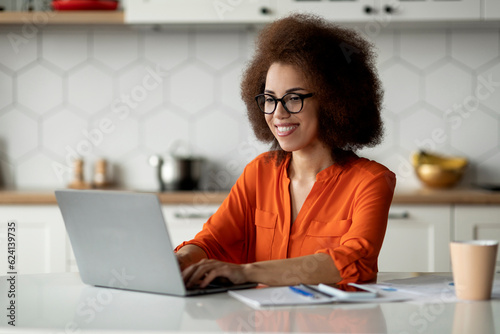 Remote Career. Happy Young Black Lady Working With Laptop At Home Office