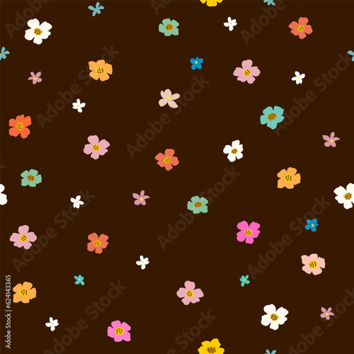 Seamless floral pattern. Multicolored small simple flowers on a dark background. Botanical fashion print for women's dresses