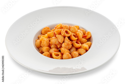 Macaroni pasta with red  tomato sauce in white dish, Italian pasta called pipette (little pipe), Isolated