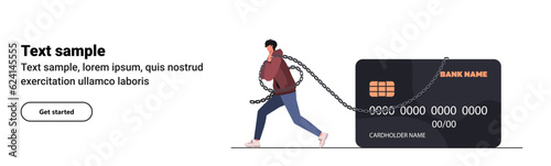  Young man wrapped in a chain pulls a credit card behind him. Debt burden concept. Financial illiteracy and debt, bankruptcy and mortgage. Banner for website. Flat vector illustration
