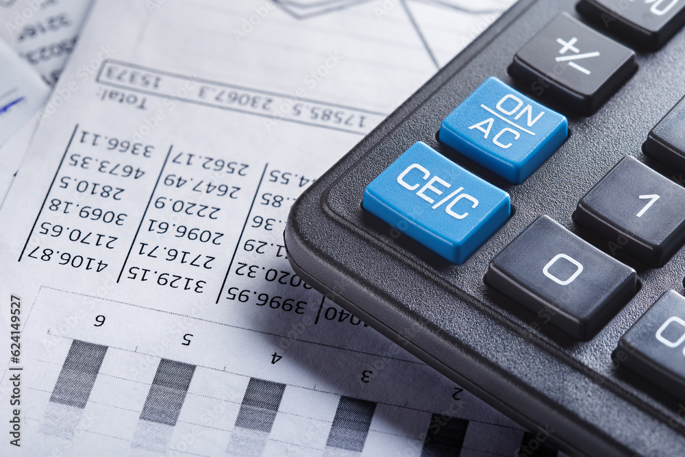 calculator and financial charts. Investment and capital accumulation concept calculator and financial charts. Investment and capital accumulation concept