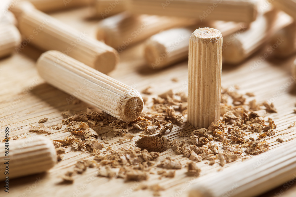 hole in wooden oak board for wooden dowel. carpentry industry. hole in wooden oak board for wooden dowel. carpentry industry.