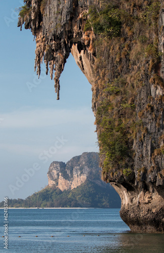 wall of limestone cliffs over the ocean, Phra Nang beach, Krabi, Thailand