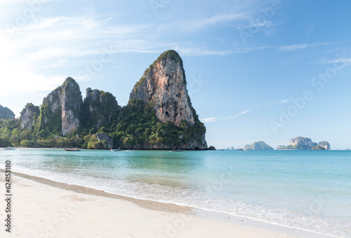 white sand beach with limestone cliffs and islands in the background, Railay beach, Krabi, Thailand