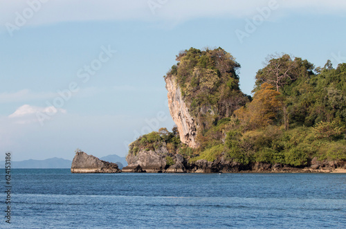 Limestone cliffs emerging from the ocean at Tonsai Beach  Krabi  Thailand