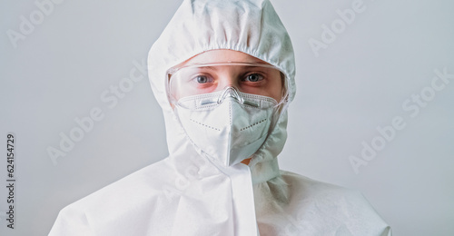 Air pollution. Protection equipment. Man made disaster. Environmental engineer scientist woman in ppe suit goggles glasses mask coverall isolated on grey background.