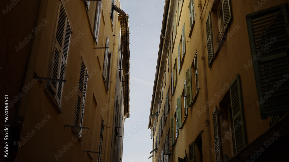 Worms eye slow motion shot of old town of Nice in spring