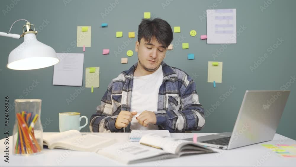 Male student falls asleep while studying. Male student falls asleep while studying.