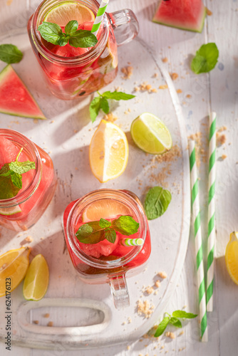 Fresh lemonade with watermelon and mint leaves.