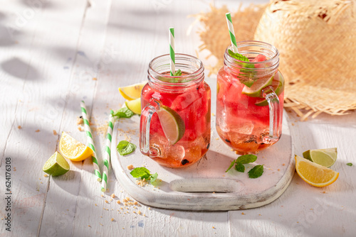 Healthy lemonade with watermelon and mint leaves.