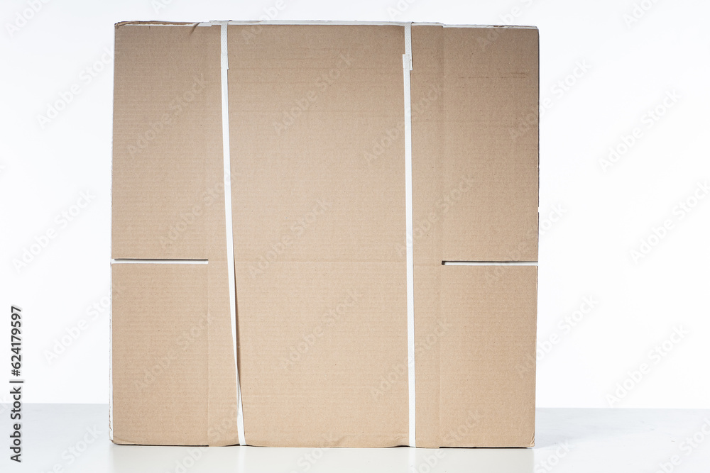 Disassembled cardboard boxes. Cardboard for packing goods. Disassembled