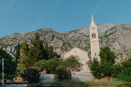 Beautiful view of the coast of Kotor Bay and St.Eustace's Church in the village Dobrota in Montenegro. Church of St. Eustachius is located in Dobrota , Kotor Montenegro.