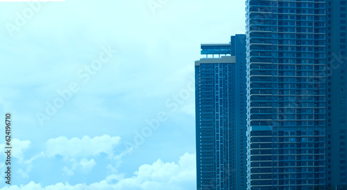 condo blur  in a lively urban atmosphere  surreal architecture photography  clear sky over the city  contemporary condos  in the midst of urban landscapes  Aerial view Spacious city living.