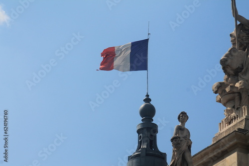 France Flag waving on building