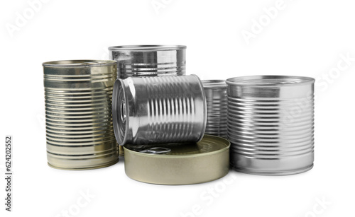 Many closed tin cans isolated on white