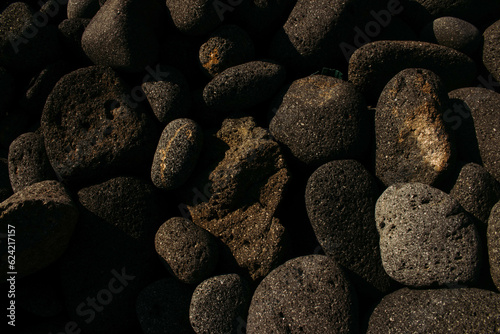 pile of stones on black