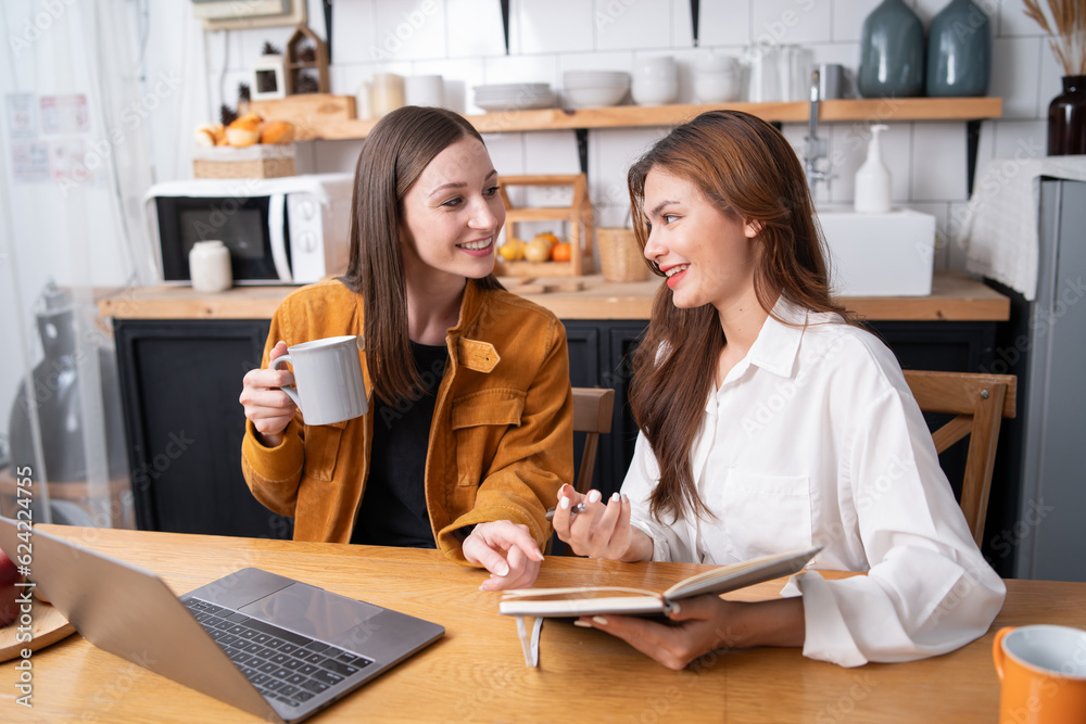 Asian businesswoman using laptop or tablet to work, discuss and discuss during company holidays. Asian businesswoman using laptop or tablet to work, discuss and discuss during company holidays.
