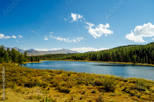 Beautiful natural landscape, picturesque mountain lake in sunny summer day. Big panorama, Altai, Siberia.