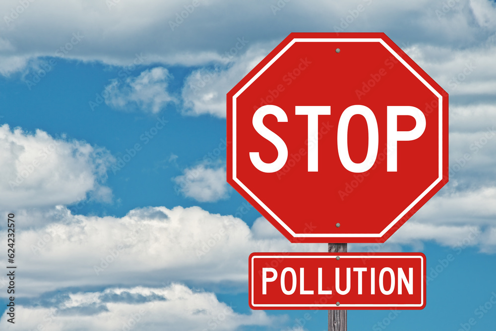 Stop Pollution Sign on Blue Sky Background Stop Pollution Sign on Blue Sky Background