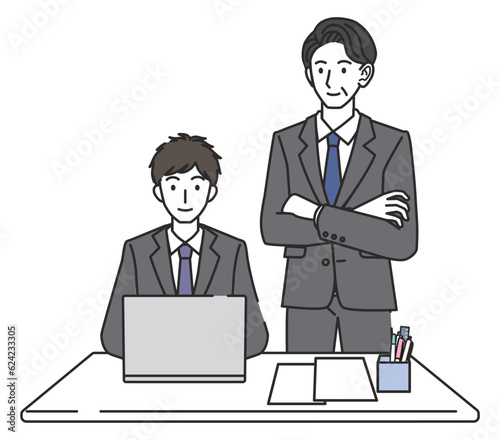 上司に指導される男性社員