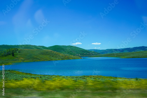 Beautiful roadside lake with surrounding mountains