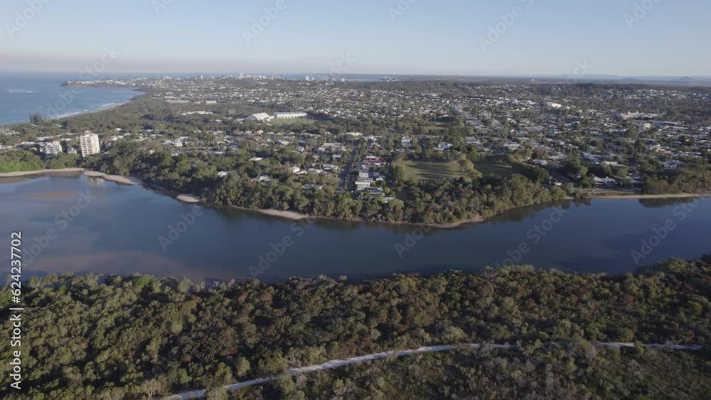 Currimundi Lake And Creek On The Coastline Of Wurtulla In Queensland, Australia. aerial pan left Currimundi Lake And Creek On The Coastline Of Wurtulla In Queensland, Australia. aerial pan left