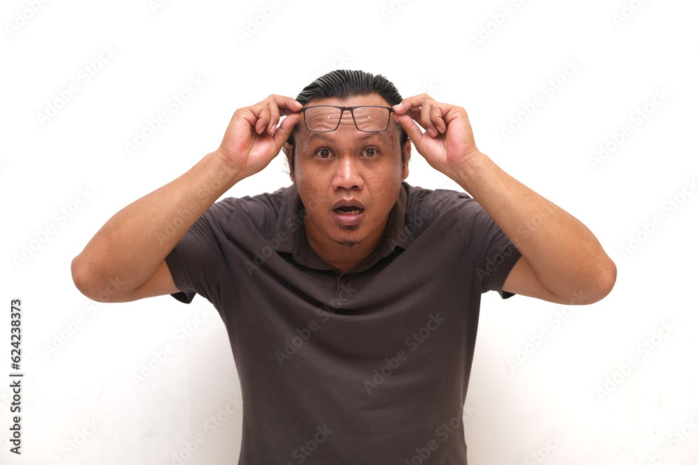 asian man with shocked expression or shocked gesture asian man with shocked expression or shocked gesture
