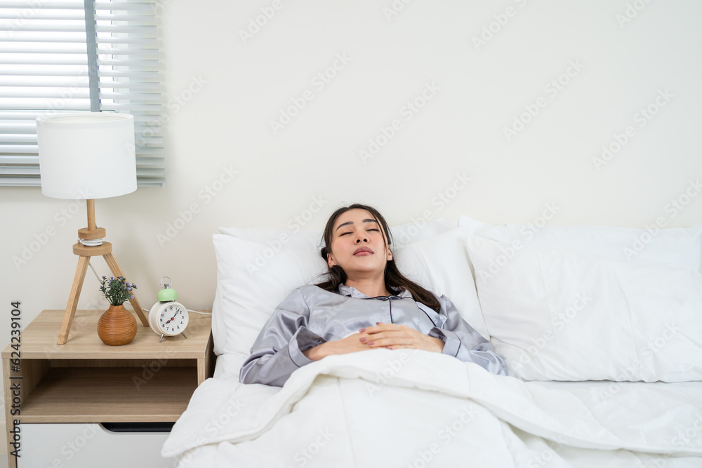 Asian young beautiful girl sleeping with happiness in bedroom at home. Asian young beautiful girl sleeping with happiness in bedroom at home.