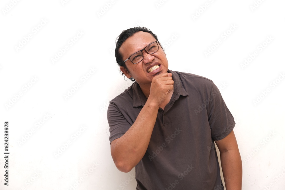 asian man with expression thinking about something, isolated white background asian man with expression thinking about something, isolated white background