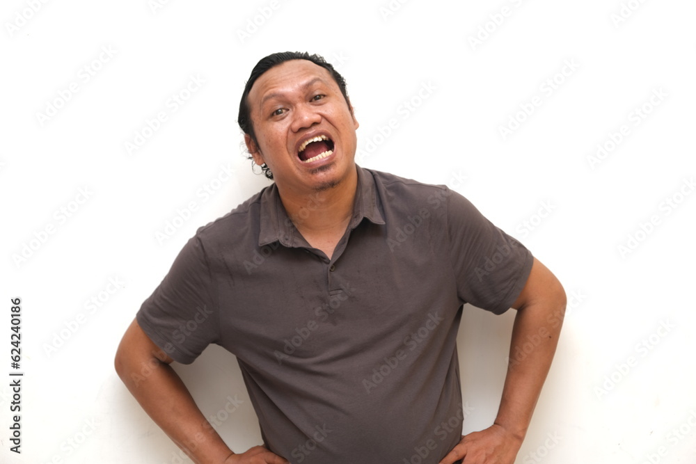 Funny shocked and surprised face of Asian man isolated on white background. Funny shocked and surprised face of Asian man isolated on white background.