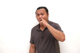 asian man picking nose isolated white background