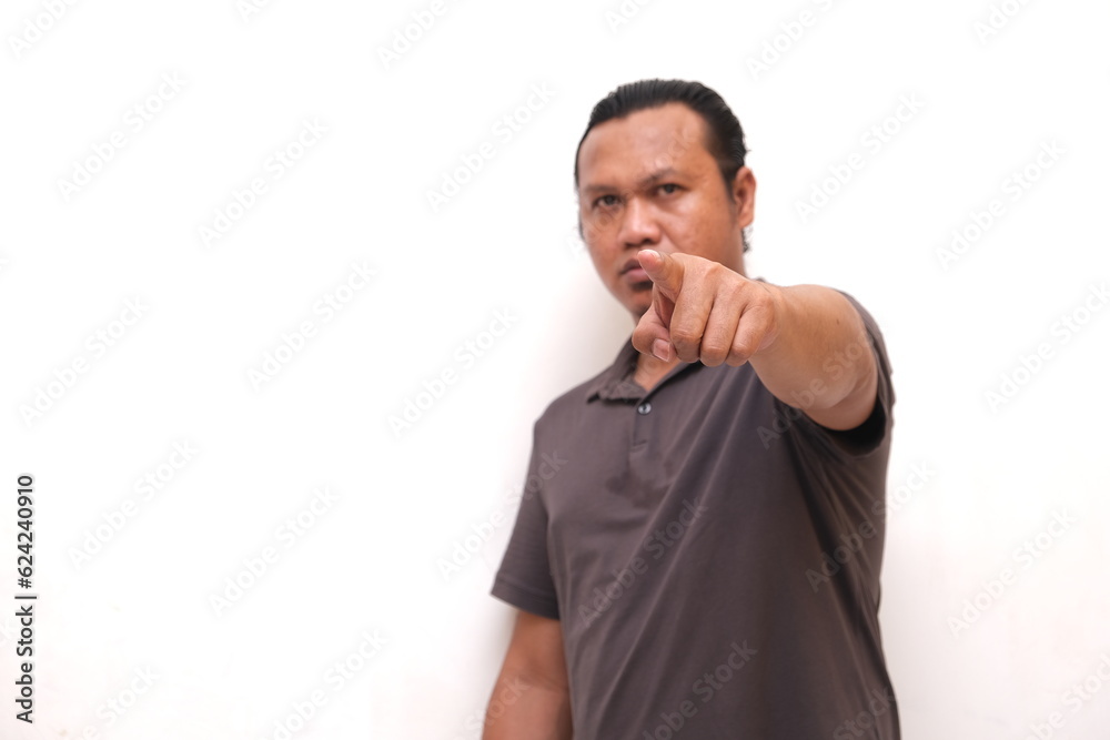 asian man pointing forward isolated white background