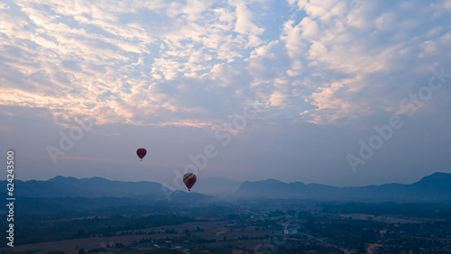Aerial view by drone Landscape Panorama view, Beautiful views of the mountains and the balloon tour, landmarks travels Vang Vieng, Laos.