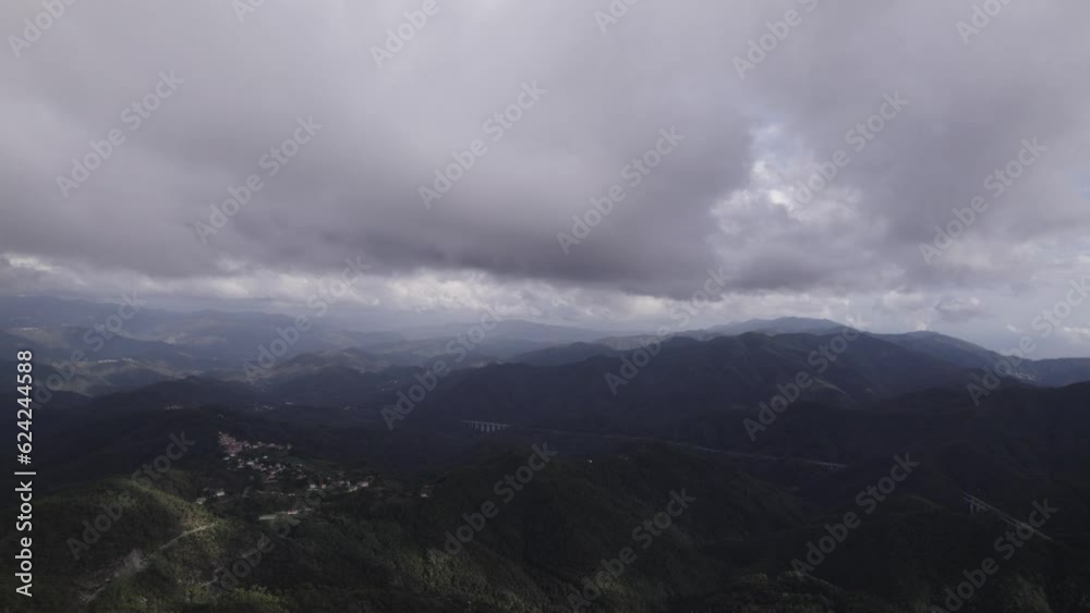 fascinating video shot over the flying pines of the Bracco pass in Italy, in the background the sea and the Deiva marina beach fascinating video shot over the flying pines of the Bracco pass in Italy, in the background the sea and the Deiva marina beach