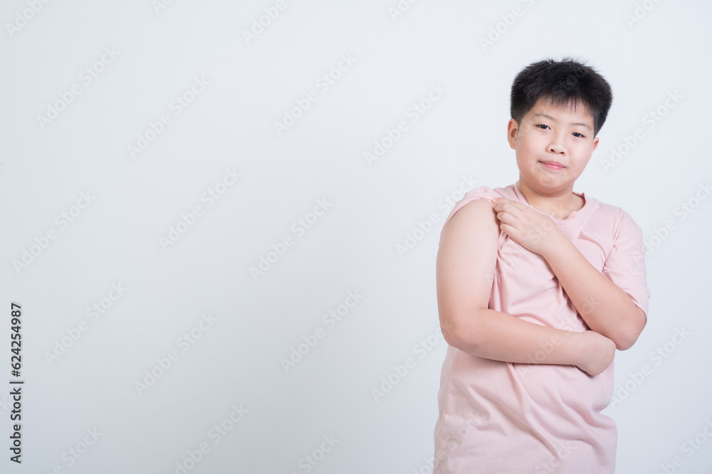 boy injecting an injection in the arm boy injecting an injection in the arm