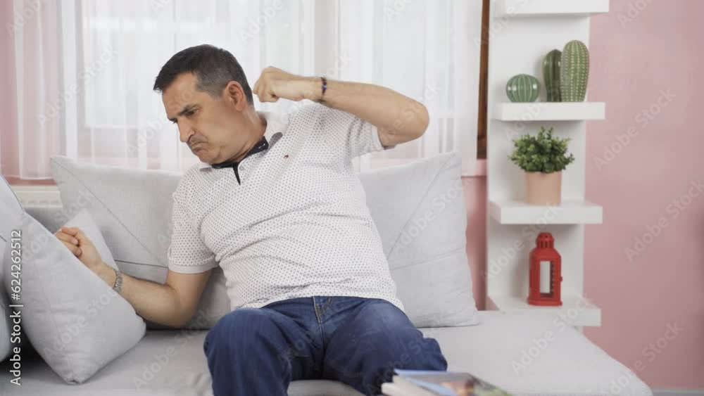 Man having a nervous breakdown at home is shouting. Man having a nervous breakdown at home is shouting.