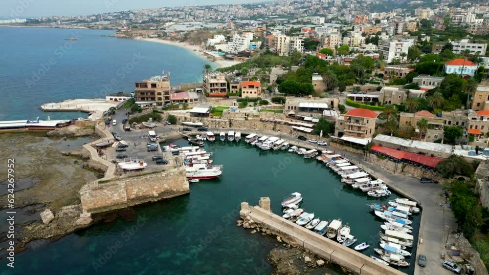 Drone shot Byblos Port in Lebanon. Ships docked in Mediterranean Sea Drone shot Byblos Port in Lebanon. Ships docked in Mediterranean Sea