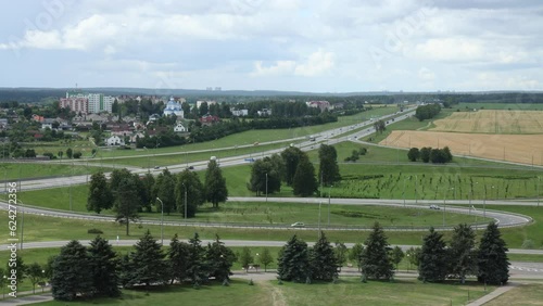 View from the Mound of Glory to the Church of the Intercession in the city of Sloboda and the road to Minsk photo