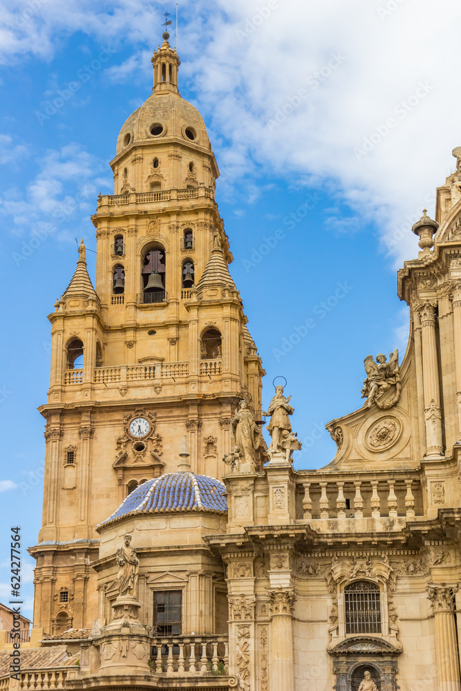 Tower and blue roof tiles on the cathedral of Murcia, Spain