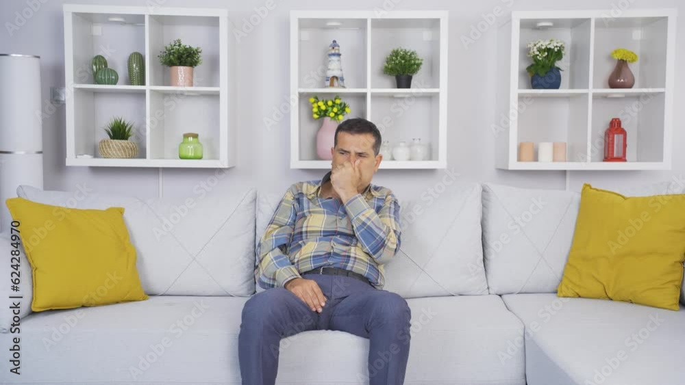 The old man, who smells the bad smell in the house, is disturbed by the bad smell. The old man, who smells the bad smell in the house, is disturbed by the bad smell.