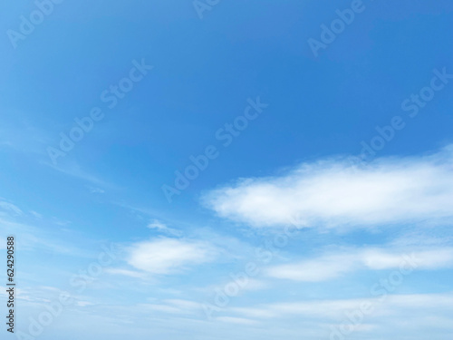 Beautiful clouds during spring time in a Sunny day. Blue sky and white fluffy clouds