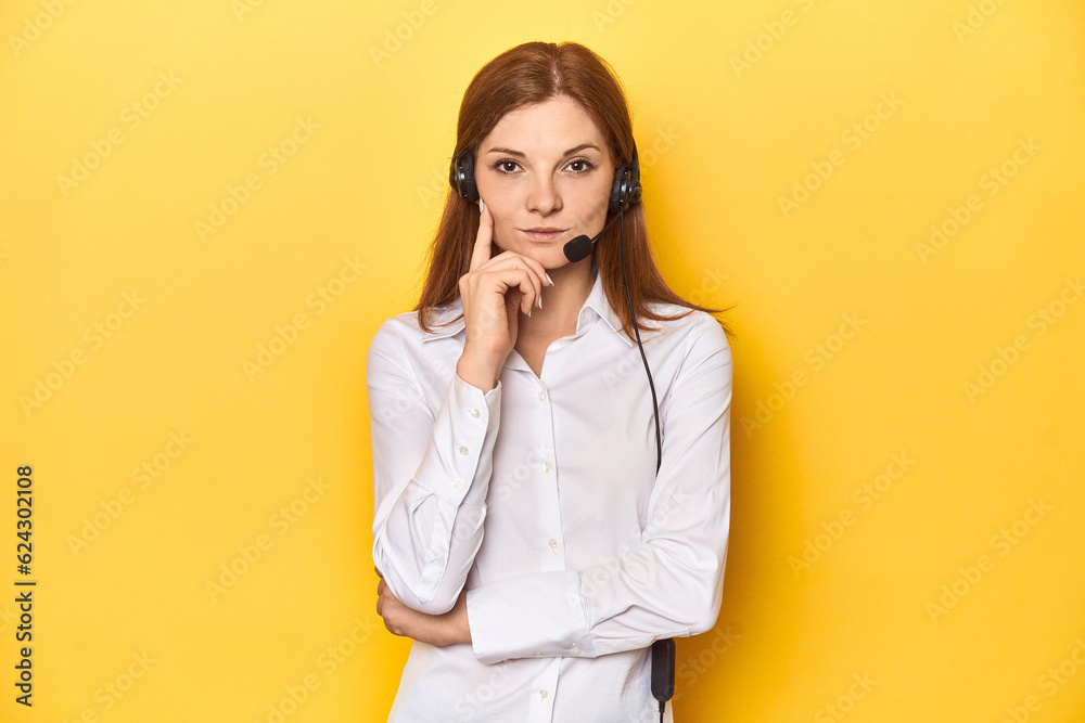 Redhead call-center operator, professional service concept. Redhead call-center operator, professional service concept.